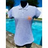 Polo gris femme avec logo orange fluo